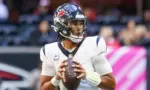Houston Texans quarterback C.J. Stroud (7) looks to throw the ball during the game against the Atlanta Falcons on October 8^ 2023 at Mercedes-Benz Stadium in Atlanta^ Georgia.