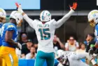 Miami Dolphins linebacker Jaelan Phillips (15) celebrates after an interception against the Los Angeles Chargers during an NFL football game^ Sept. 10^ 2023^ in Inglewood^ Calif.