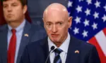 Mark Kelly^ US Senator. Delegation of senators and congressmen^ during press briefing after meeting with Evika Silina^ Prime Minister of Latvia. RIGA^ LATVIA. 30th August 2024