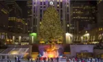 Ice skaters fill the skating rink under the Rockefeller Center Christmas tree^ a popular holiday tourist attraction in Midtown Manhattan.NEW YORK CITY - DECEMBER 10^ 2015