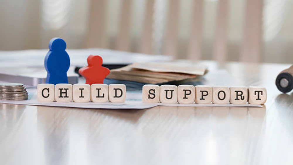 word-child-support-composed-of-wooden-letters-closeup