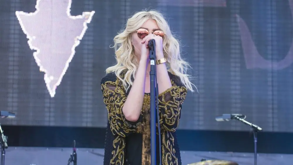 Taylor Momsen of The Pretty Reckless performs on stage at the 2014 iHeartRadio Music Festival Village on September 20^ 2014 in Las Vegas.