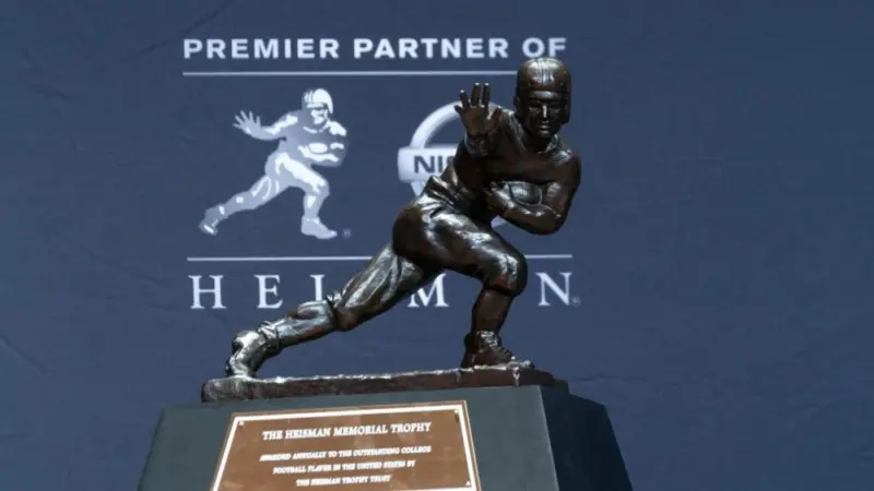 New York^ NY - December 14^ 2019: Heisman Memorial Trophy trophy on display at the Marriott Marquis Hotel