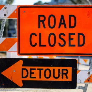 road-closed-and-detour-signs-w-barrier-up-close
