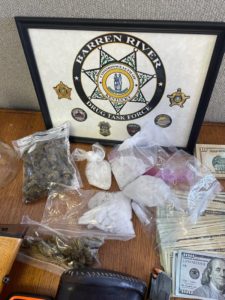 confiscated drugs and cash
