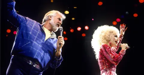 s5x4o-1768321439-5700-quiz-dolly_and_kenny758535