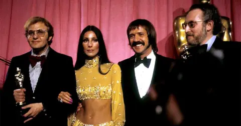 r3zo1-1773672756-5824-quiz-oscars_best_song261010