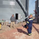 221022-kevin-heeg-with-firefighters-at-grain-dryer1-150x150-1