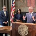 governor-edwards-with-meagan-kaiser-and-mike-steenhoek-6-13-23-150x150900886-1