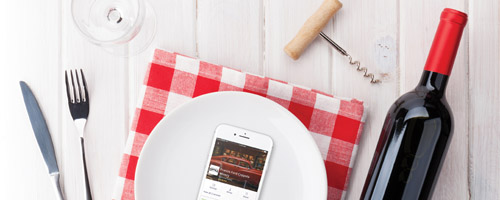 table-setting-with-empty-plate-wine-glass-and-red-wine-bottle-4