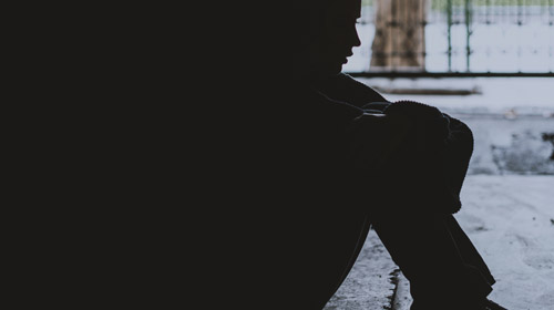 homeless-woman-sitting-on-the-street-side-hopeless-2