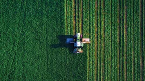 tractor-mowing-green-field-aerial-view-agricultural-concept-2