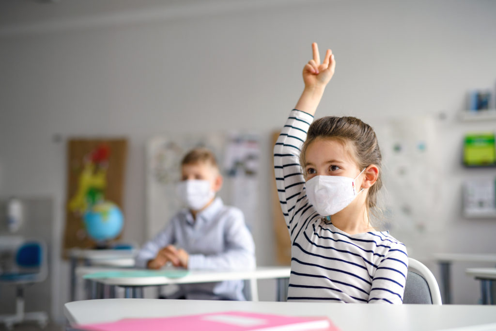 childwithfacemaskbackatschoolaftercovid-19quarantine