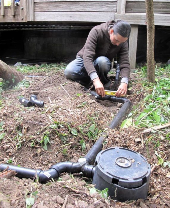 graywater-system-leveling-pipes