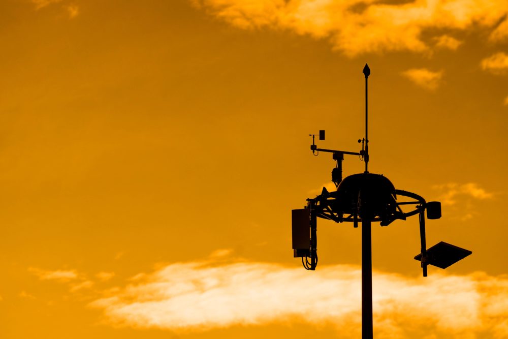 silhouetteofweathermeasurementunitwithblueskybackground