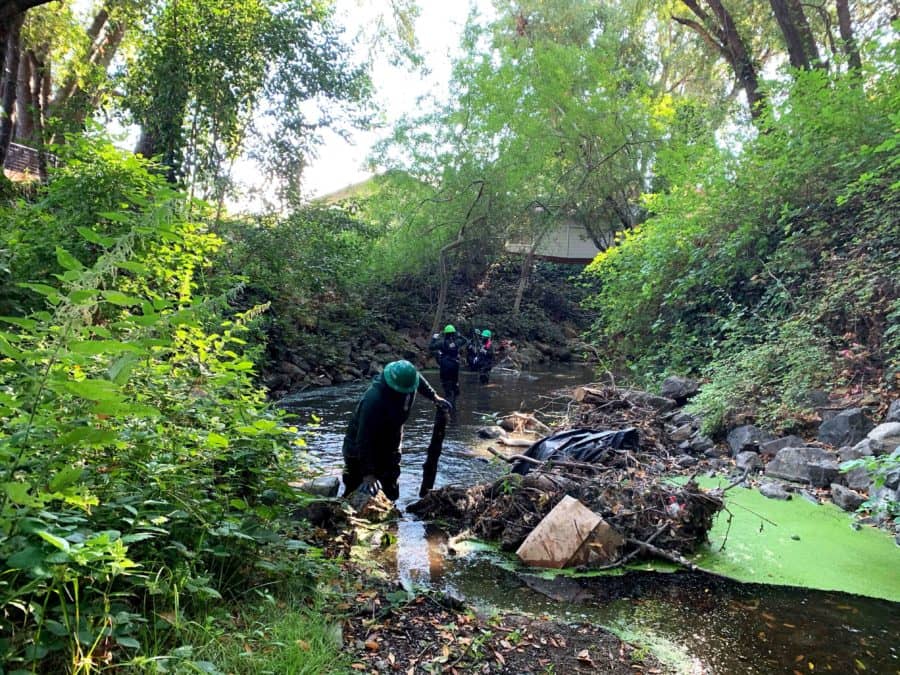 north-bay-conservation-corps-crew-assisting-dpw-staff-with-debris-clearing-in-novato-creek