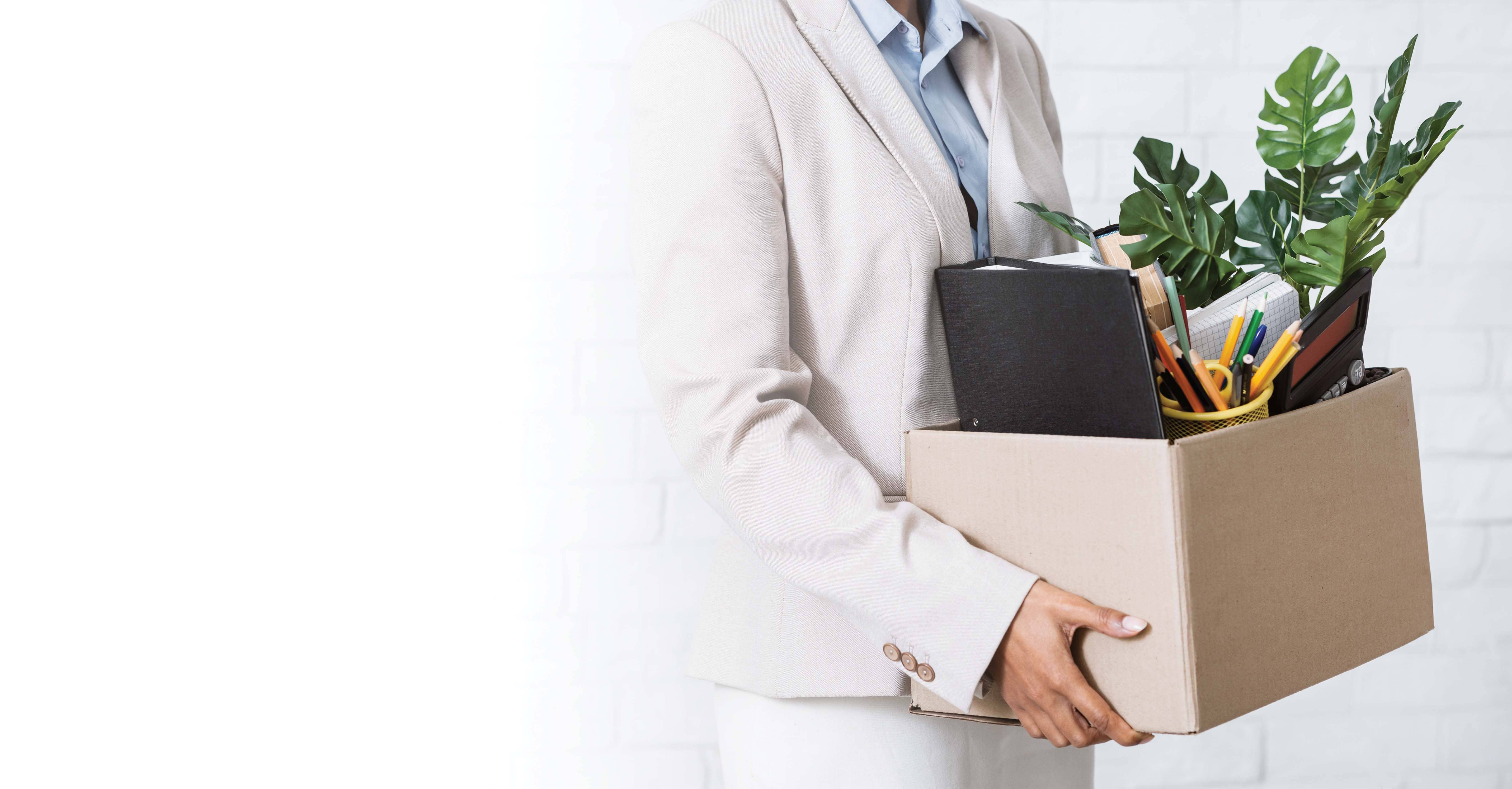 unrecognizable-black-woman-holding-box-of-personal-belongings-l