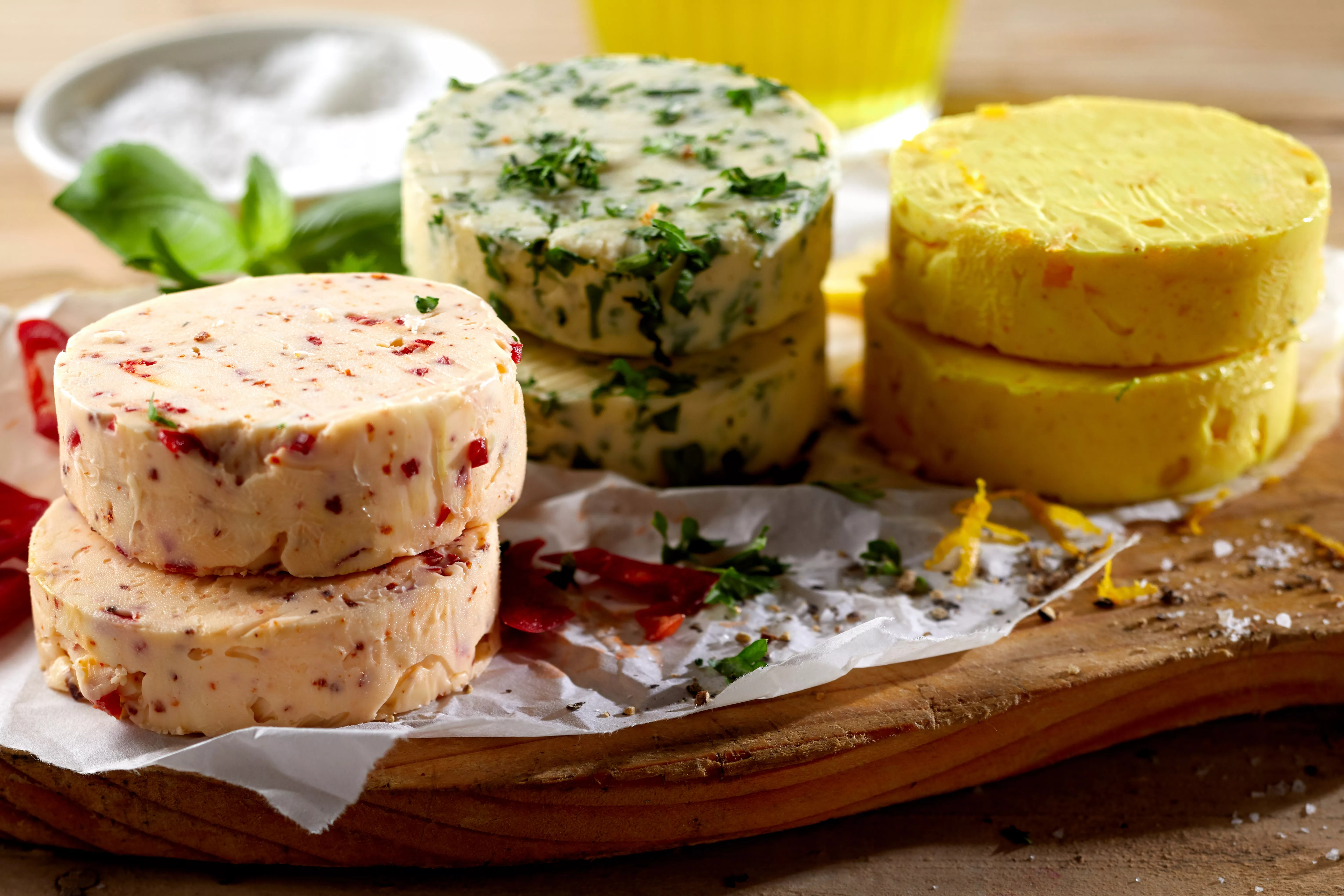 assortedflavorsofsavorybutterpatswithingredientsincludingchili