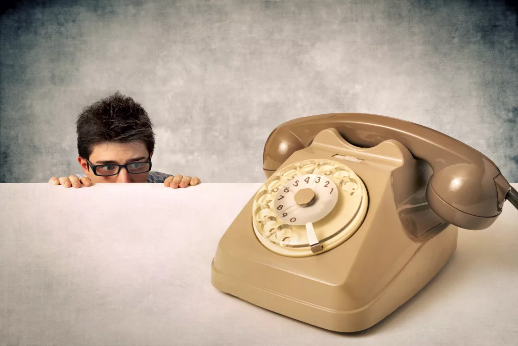 youngbusinessmanisafraidofthephone