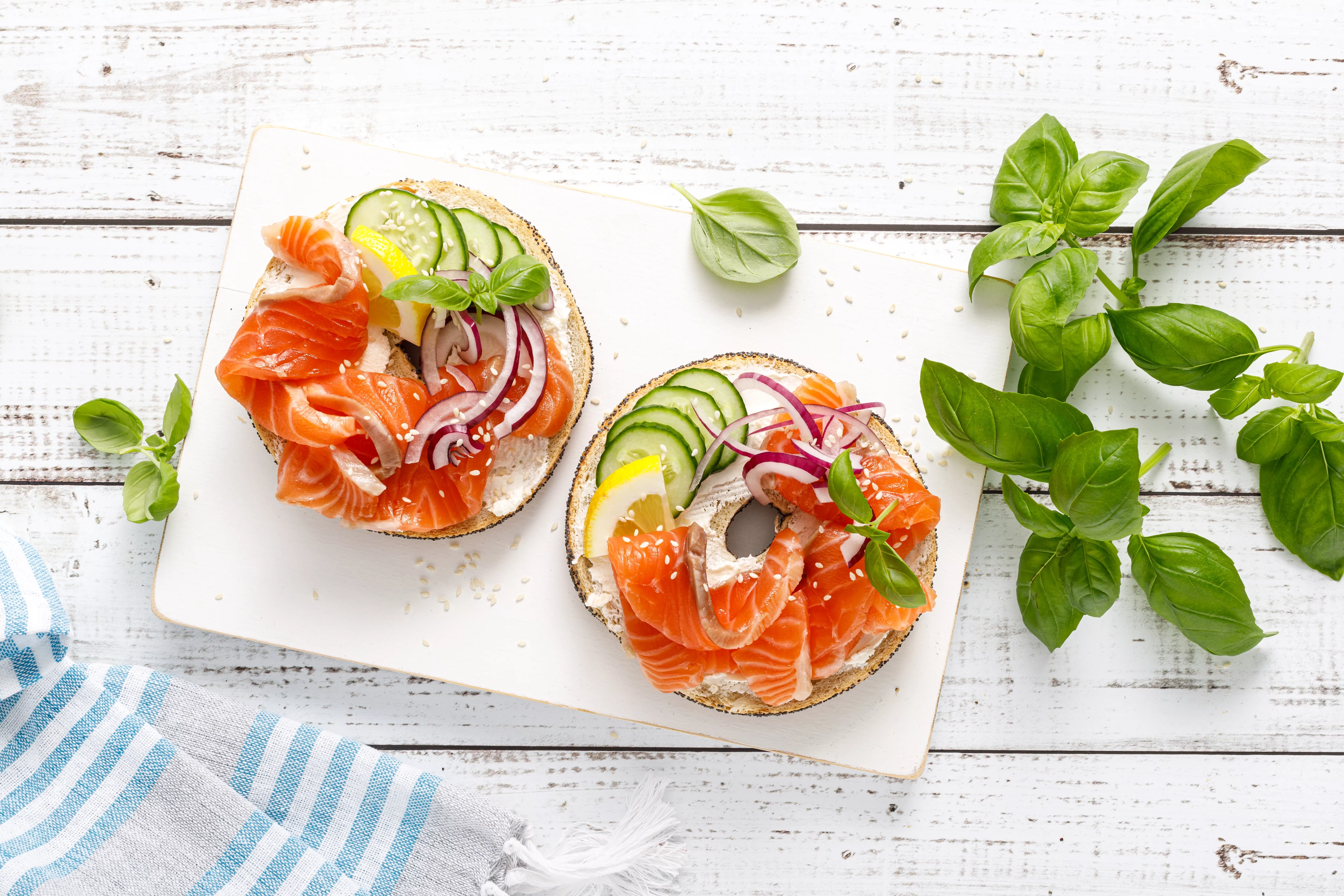 salmonsandwicheswithbagelsaltedfishfreshcucmberonionand