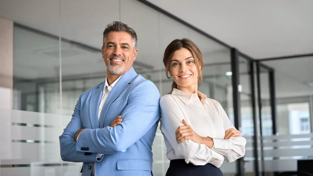 twohappyexecutivemanagersmaturebusinessmanandwomanleaders