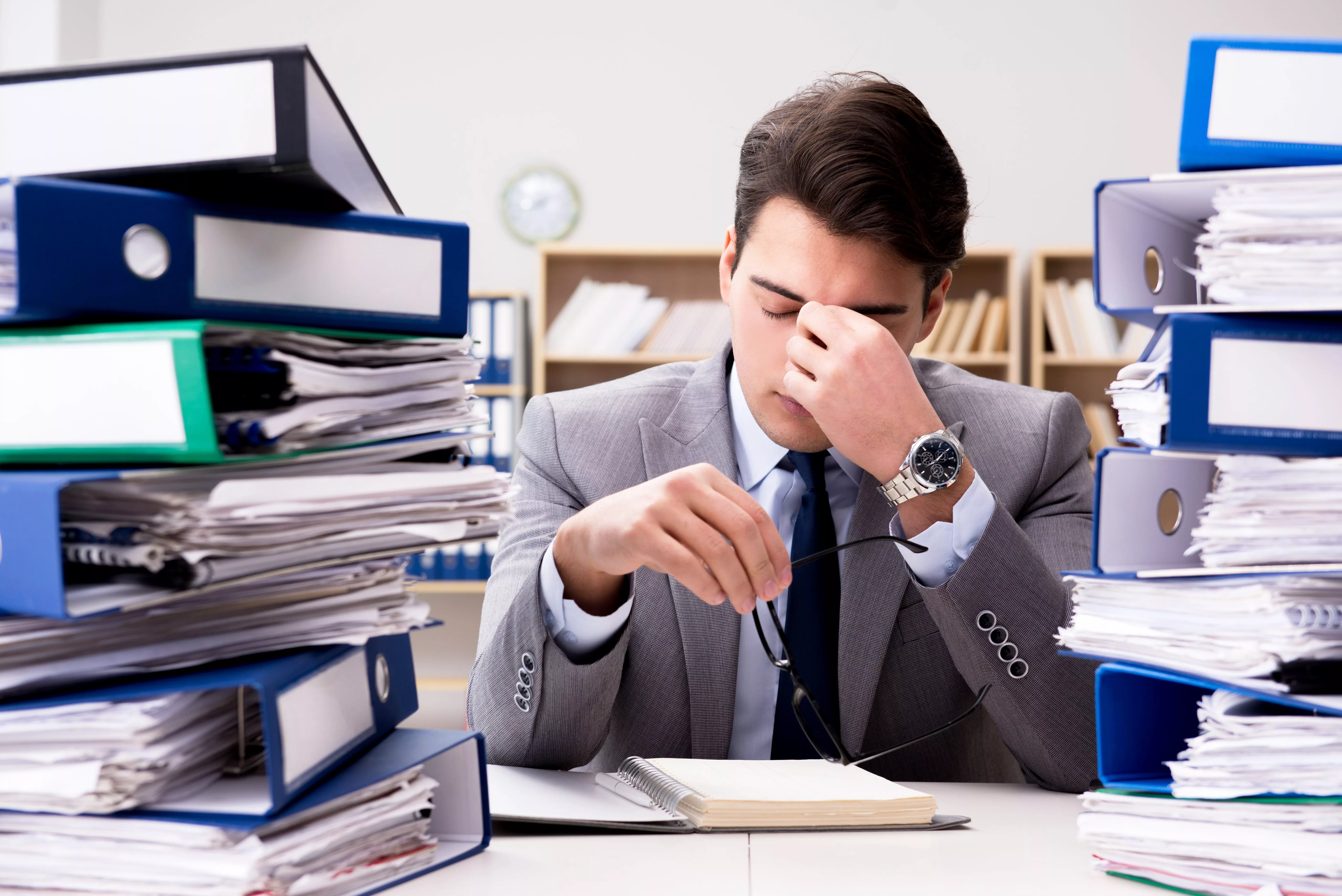busybusinessmanunderstressduetoexcessivework