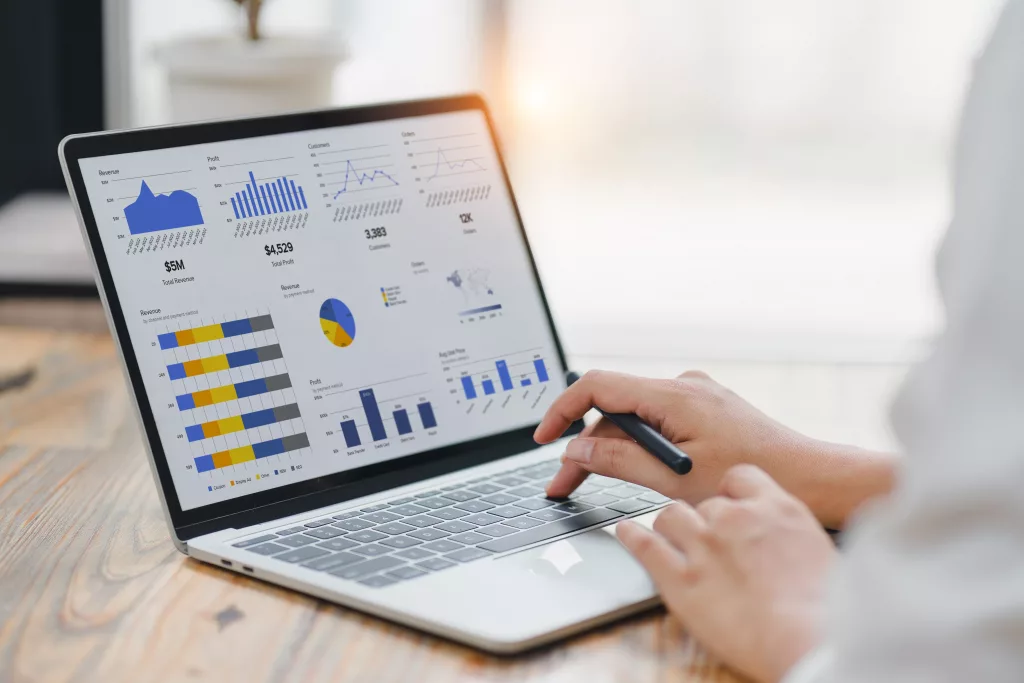 professionalanalyzingfinancialdatagraphschartsonlaptopdisplayat