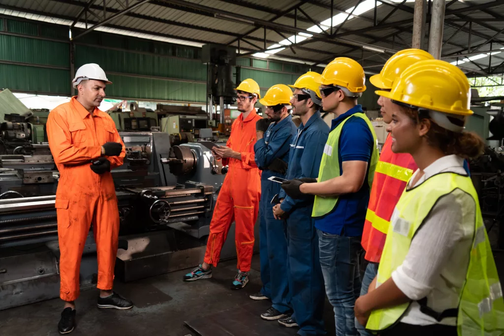 skillfulworkerattendingbriefmeetinginthefactory-industrial