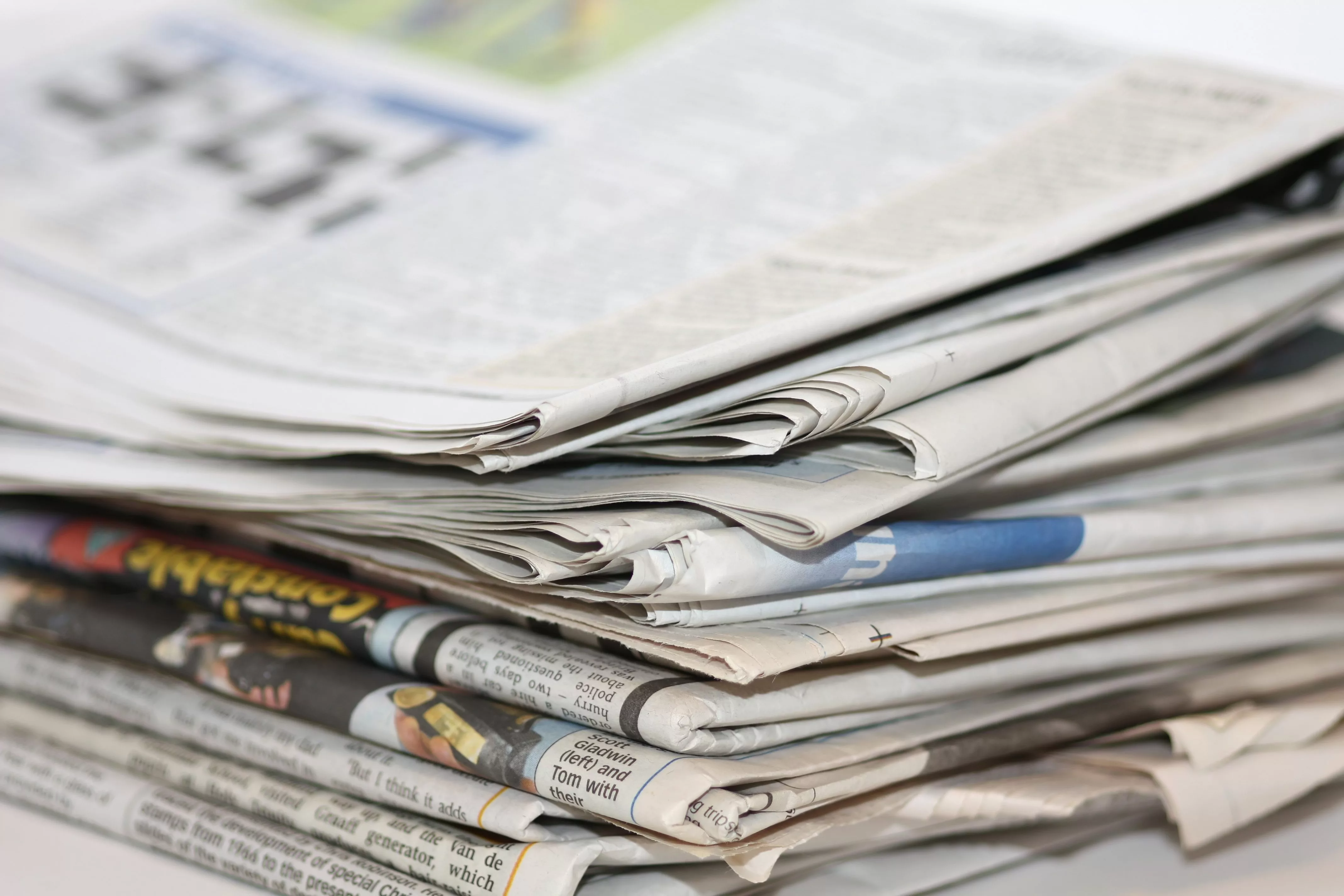 closeupimageofapileofnewspaper