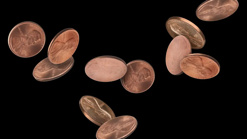unitedstatesonecentcoinsinaironblackbackground