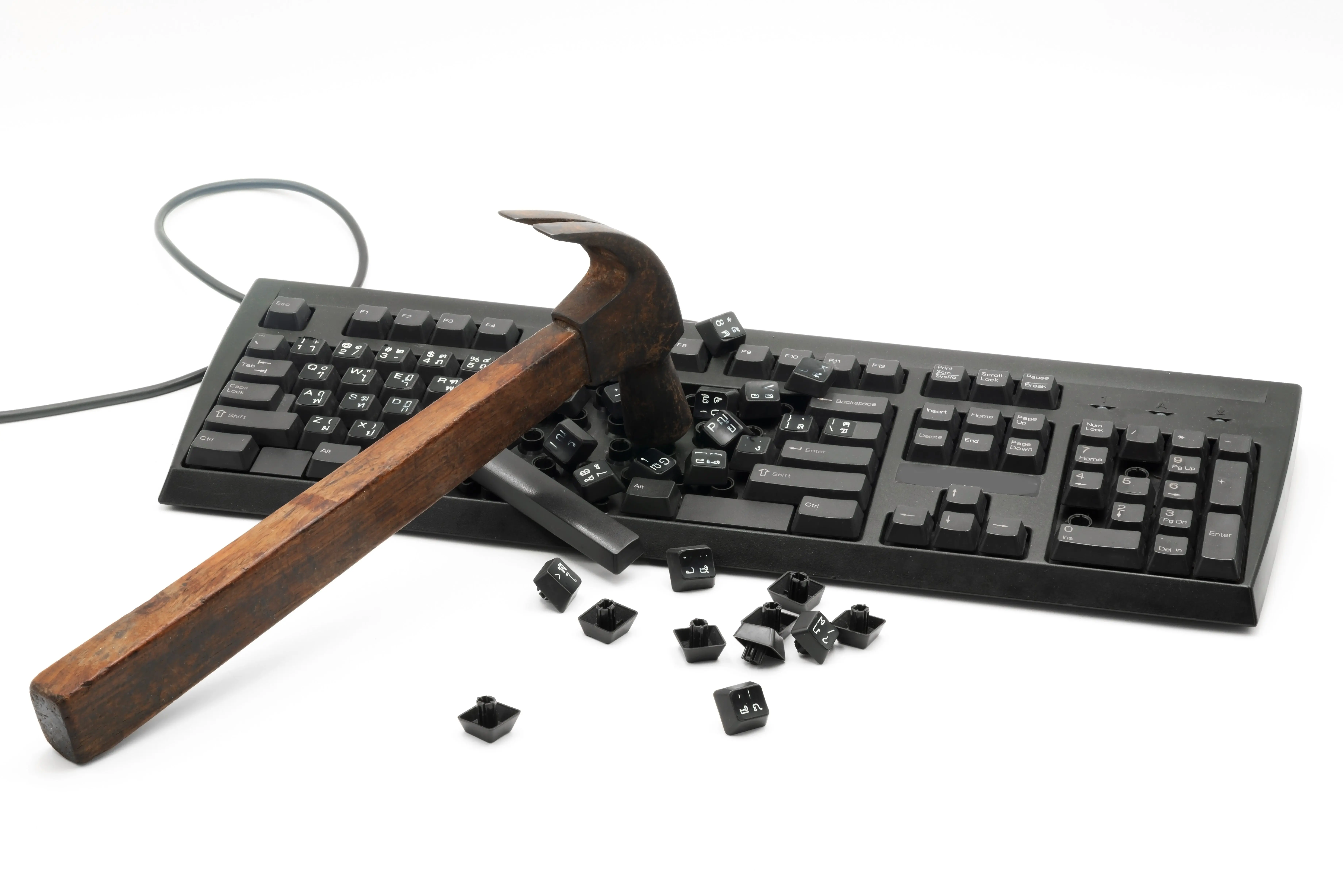 ahammerstrikesakeyboardshatteringkeysontothesurface