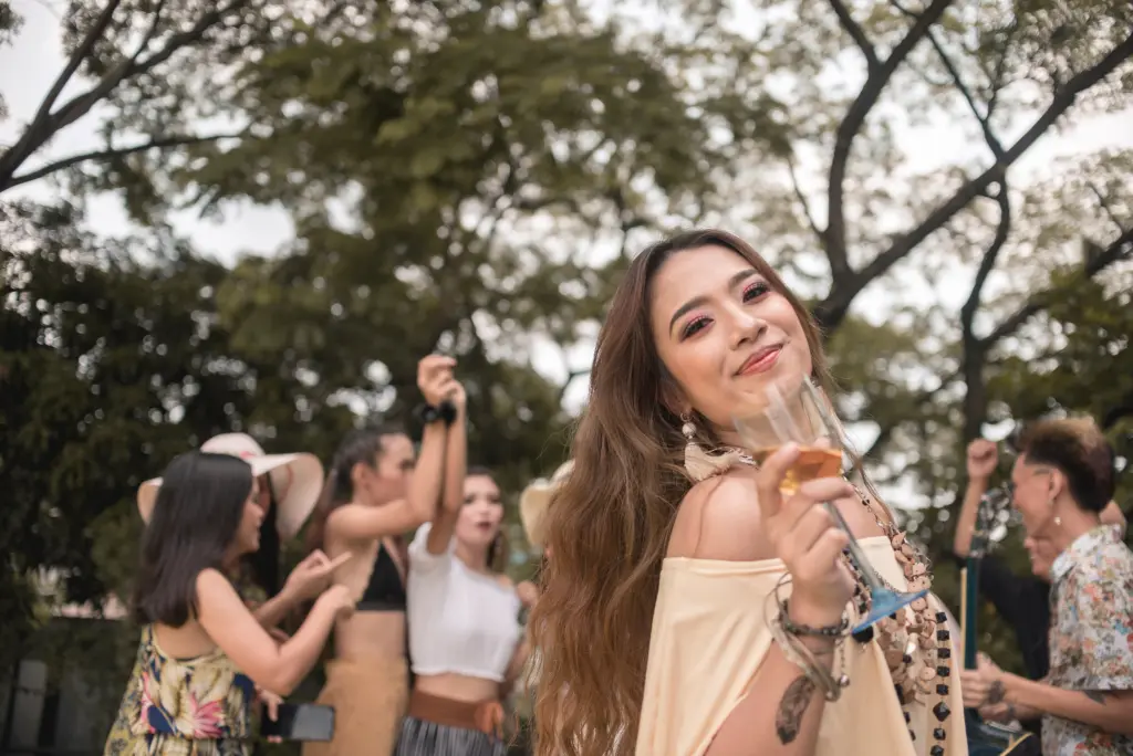 ayoungasianwomanenjoysabohothemedpartyor