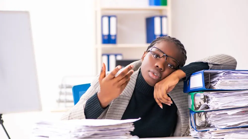 blackfemaleemployeeunhappywithexcessivework