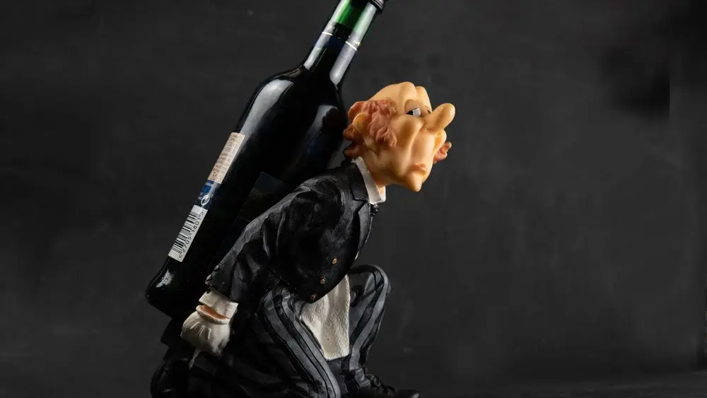 analcoholicholdingabottleofboozeonhisshoulders