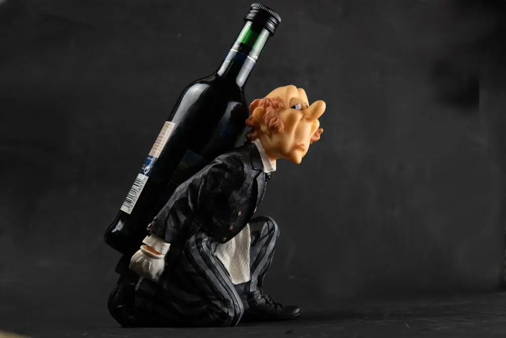 analcoholicholdingabottleofboozeonhisshoulders