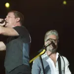 Matchbox 20 band vocalist Rob Thomas (L) performs during the Rock in Rio concert^ on September 20^ 2013 in Rio de Janeiro^ Brazil.