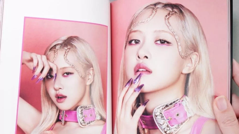 BlackPink BORN PINK 2nd Album photobook featuring member ROSE with x on grey. Pink music CD in player.