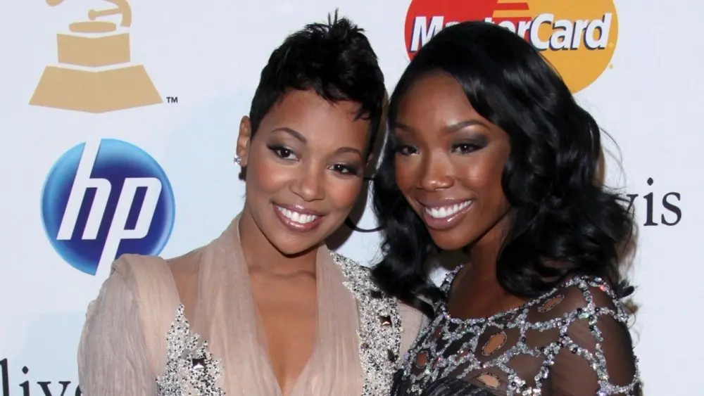 Monica^ Brandy Norwood arrives at the 2011 Pre-GRAMMY Gala And Salute To Industry Icons Beverly Hills^ CA