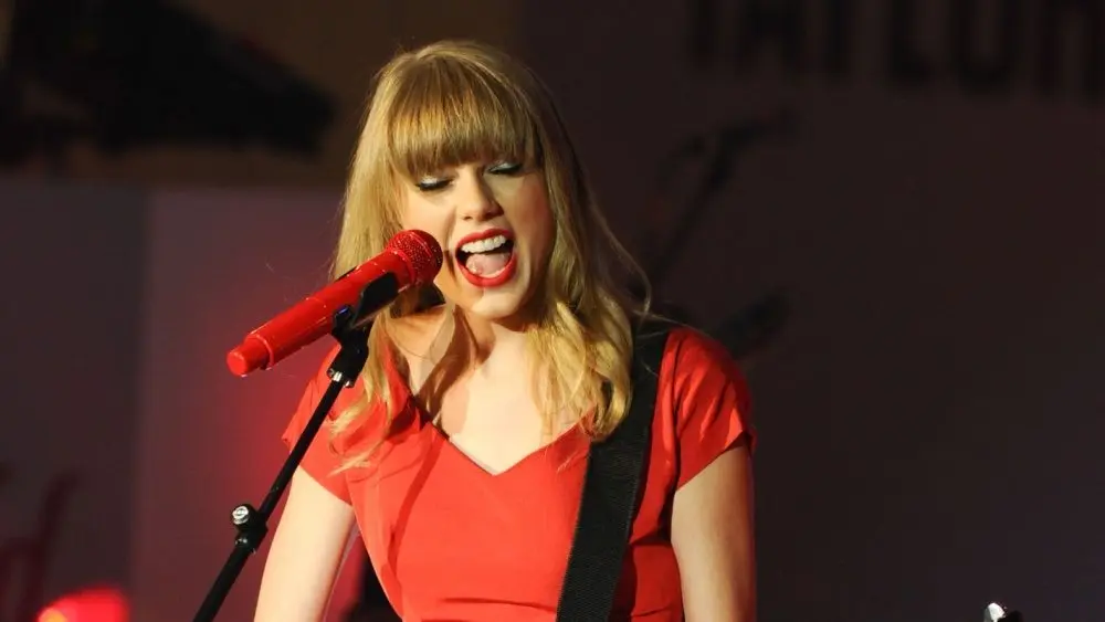 Taylor Swift performs and turns on the Christmas Lights at Westfield Shepherd's Bush^ London. 06/11/2012