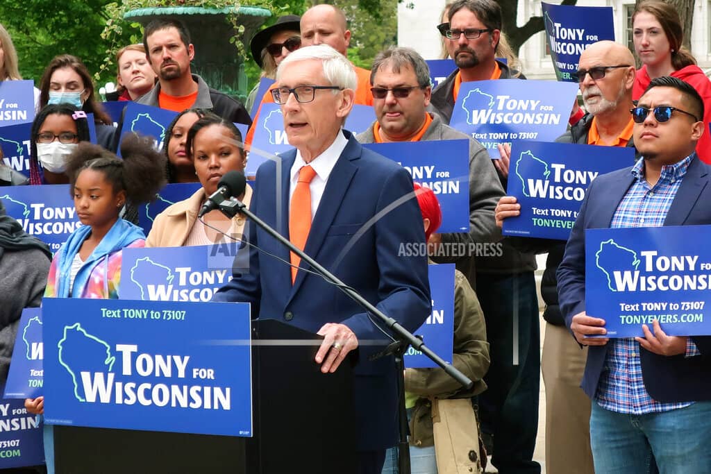FILE - Wisconsin Gov. Tony Evers speaks at a campaign event outside the state Capitol Friday, May 27, 2022, in Madison, Wis. Evers, a Democrat, hopes to translate anger over the U.S. Supreme Court's overturning of Roe v. Wade into votes this fall as he vows to fight a 173-year-old state abortion ban in any way he can. (AP Photo/Scott Bauer, File)