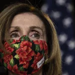 pelosi-with-rose-mask338311