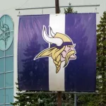 EDEN PRAIRIE^ MN/USA - August 13^ 2015: Minnesota Vikings practice facility and flag. The Minnesota Vikings are a professional American football team based in Minneapolis^ Minnesota.