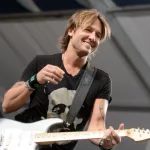 Keith Urban performs at the 2015 New Orleans Jazz and Heritage Festival. New Orleans^ LA - April 24^ 2015