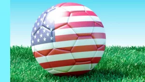 soccer balls in USA flag colors on green grass. Women's soccer. 3d image