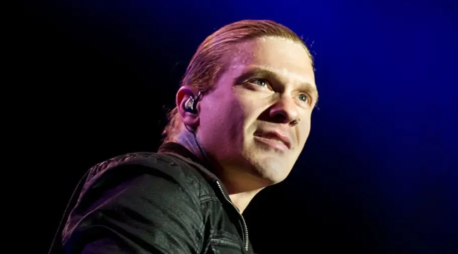 Brent Smith of Shinedown against a black and blue background at Rockstar Uproar Festival on September 25 2012 in Nampa^ Idaho.