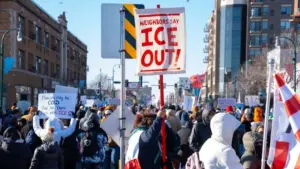 Minneapolis^ Minnesota^ USA 12.12.25 Hundreds of people gather to protest against ICE raids^ Trump and other political views during a cold day in Minnesota
