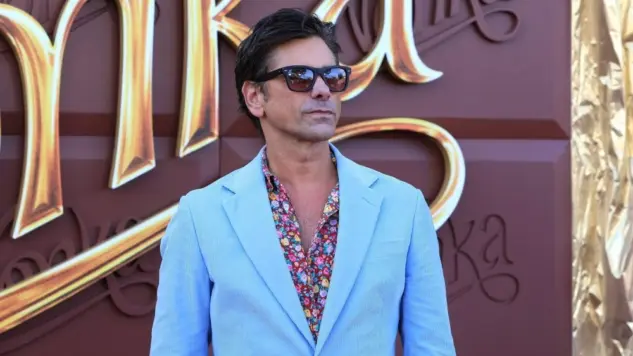 John Stamos at the Wonka Los Angeles Premiere at the Village Theater on December 9^ 2023 in Westwood^ CA