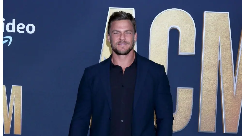 Alan Ritchson at the 2022 Academy of Country Music Awards Arrivals at Allegient Stadium on March 7^ 2022 in Las Vegas^ NV
