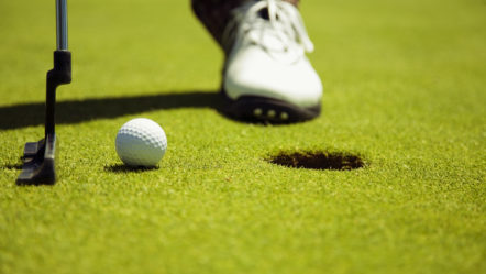 adult-man-playing-and-hitting-golf-ball