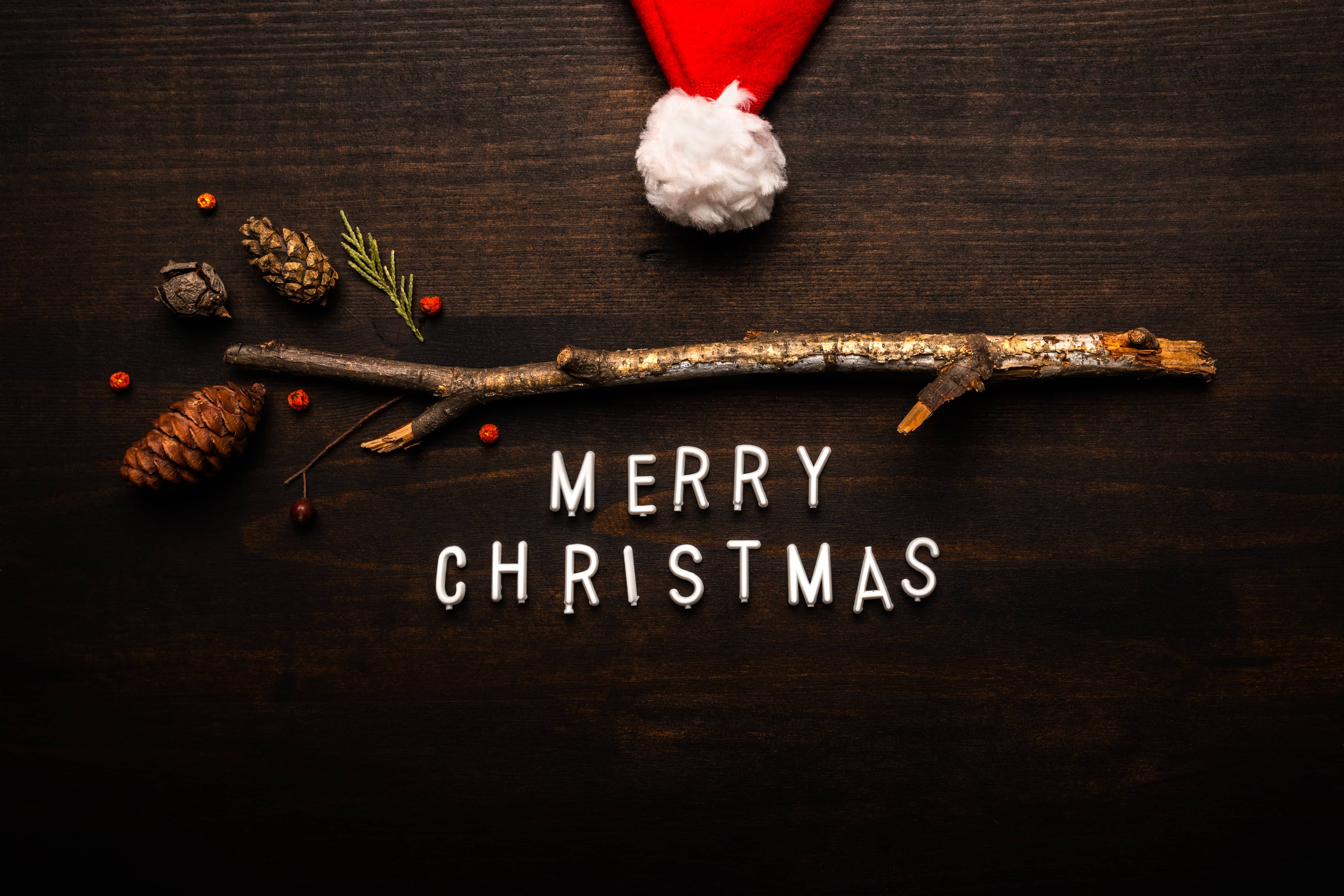 santa-claus-hat-and-merry-christmas-text